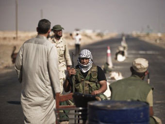 Противники Каддафи взяли порт Сирта