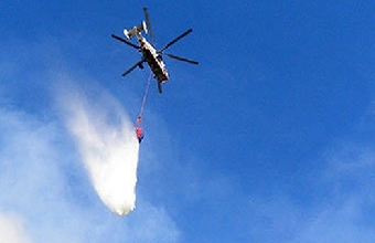 Вертолет МЧС, который тушил пожары в России, отозвали обратно