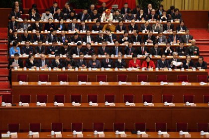 Китайского политического советника заподозрили в коррупции