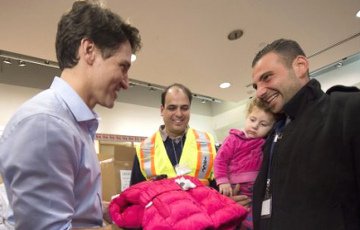 Премьер Канады лично встретил первую группу сирийских беженцев
