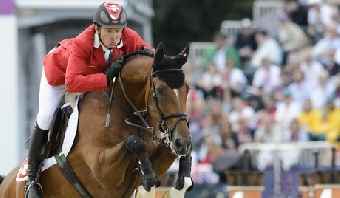 Швейцарский всадник Стив Гюрда стал олимпийским чемпионом в конкуре