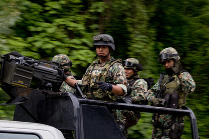 В Мексике троих солдат обвинили в убийстве безоружных преступников