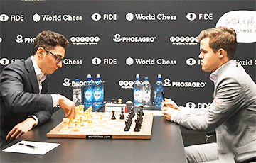Каруана и Карлсен сыграли вничью в 11-й партии матча за шахматную корону