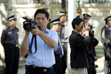 Семьям погибших журналистов в Китае выплатят по 50 тысяч долларов