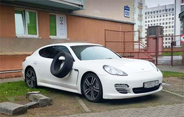 Владельцу белого Porsche в Минске «намекнули» на парковку не в том месте