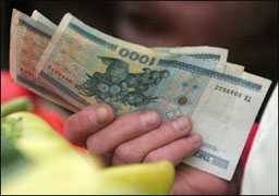 Эксперты: Белорусский рубль упадет на 60%