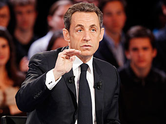 Саркози пригрозил подать в суд на Стросс-Кана