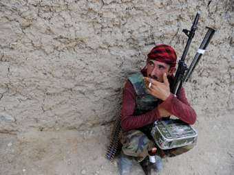 Войска коалиции задержатся в Афганистане из-за местных военных