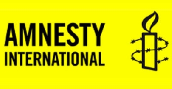 Берлин: «Международная амнистия» требует (Фото)