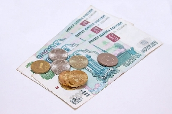 Белорусский рубль незначительно ослаб к доллару и российскому рублю