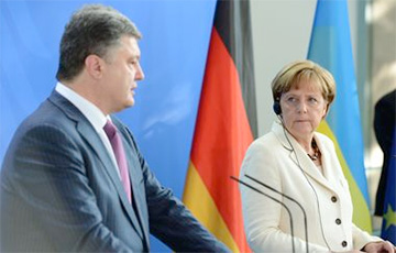 Порошенко и Меркель согласовали вопрос поддержки Украины накануне саммита G7