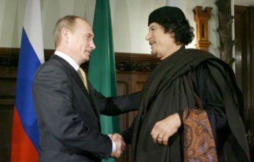 Путин попал в компанию Хусейна и Муаммара Каддафи