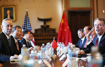 Bloomberg: США добиваются от Китая отказа от девальвации юаня