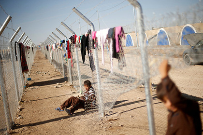 Переодетый в женщину смертник убил 14 человек в иракском лагере беженцев