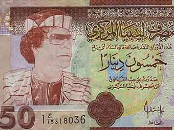 В Ливии выведут из обращения банкноты с портретами Каддафи