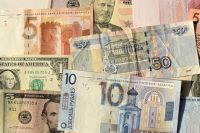 На торгах 14 ноября доллар и евро подорожали, а российский рубль подешевел