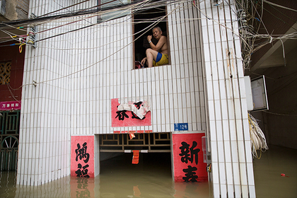 Жертвами наводнения в Китае стали десятки человек