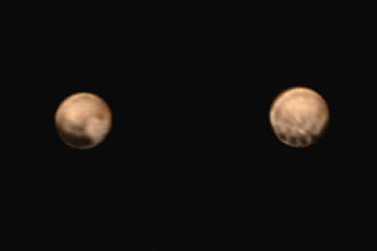 НАСА показало самые качественные цветные снимки Плутона